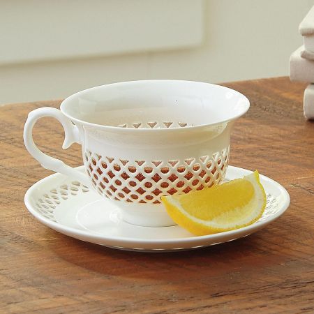 Elegant Cutout Pattern Teacup & Saucer